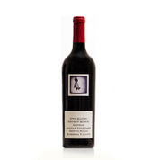 Bottle of Two Hands Secret Block Single Vineyard Shiraz wine with a red cap and a label that includes the brand name and the vineyard's location in the Barossa Valley.