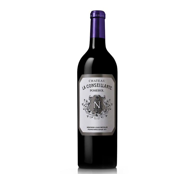 Bottle of Chateau La Conseillante Pomerol wine with a dark label and a purple cap, displayed against a white background.