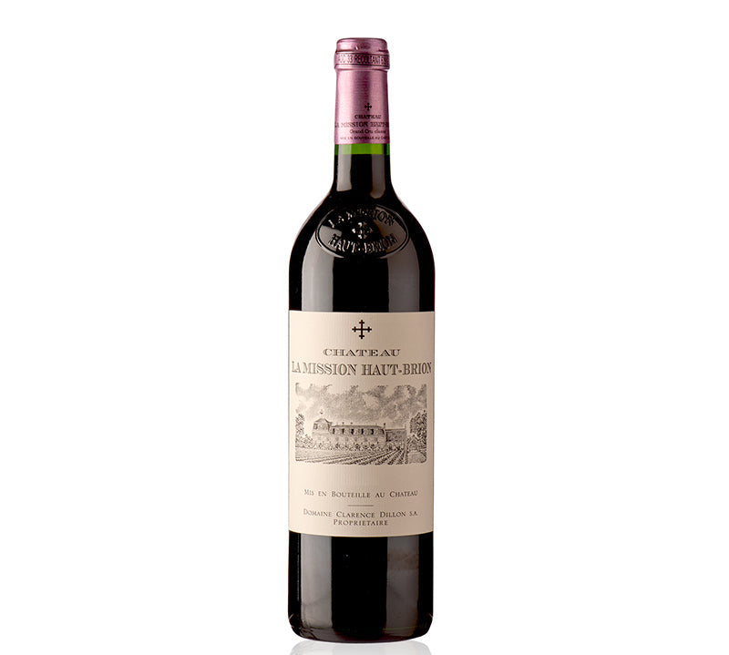 Bottle of Chateau la Mission Haut Brion Pessac-Leognan wine with a label that includes the wine name and details about the vintage.