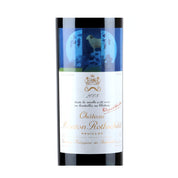 Bottle of Château Mouton Rothschild 2008 with dark berry, cassis, plum, cedar, and spice notes.