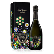 Bottle of Dom Perignon champagne with colorful floral design packaging on a white background