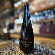 A bottle of Henri Giraud Ay Grand Cru Brut champagne