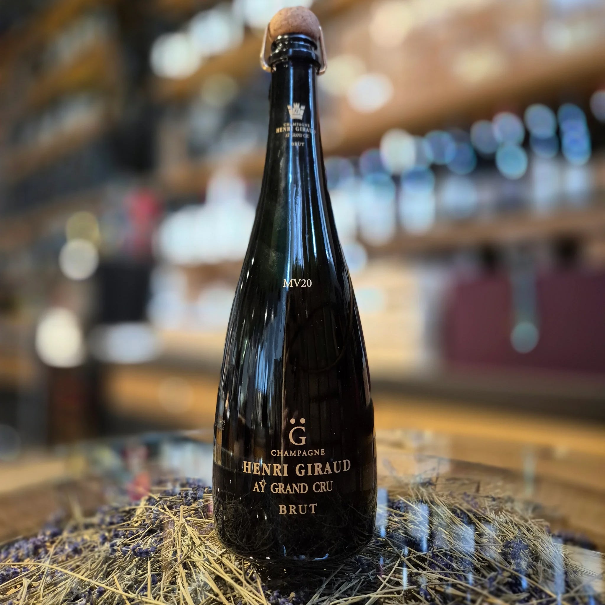 A bottle of Henri Giraud Ay Grand Cru Brut champagne
