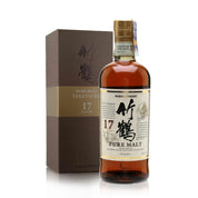 A bottle of Nikka Whisky Taketsuru Pure Malt Japanese Whisky with a gift box and Japanese text on the label, indicating its age of 17 years.