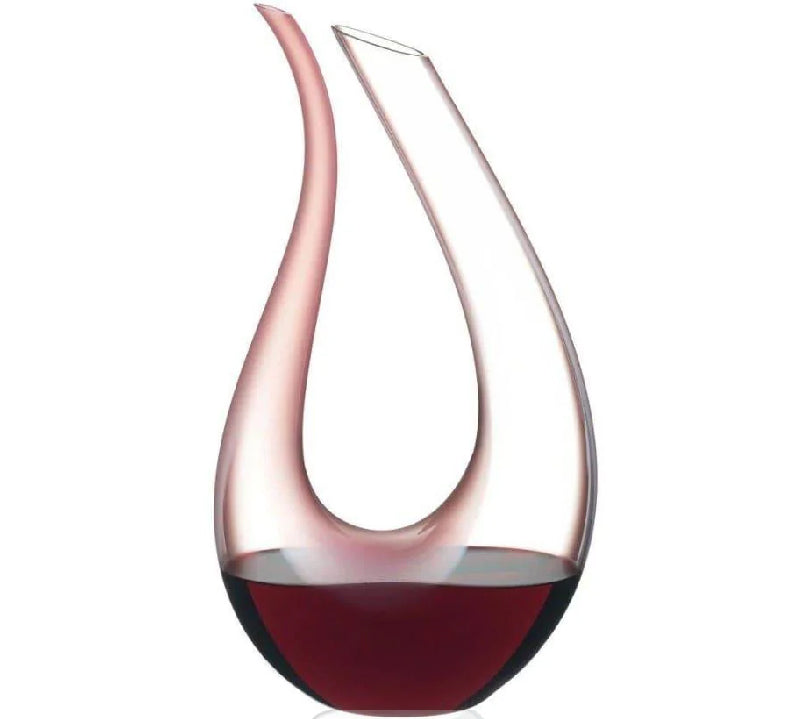 Stunning mouth-blown crystal decanter from Riedel, part of the Amadeo Rosa 1756 series. Holds 1.3 L, featuring a delicate pink hue that elevates wine aeration with elegance and style.