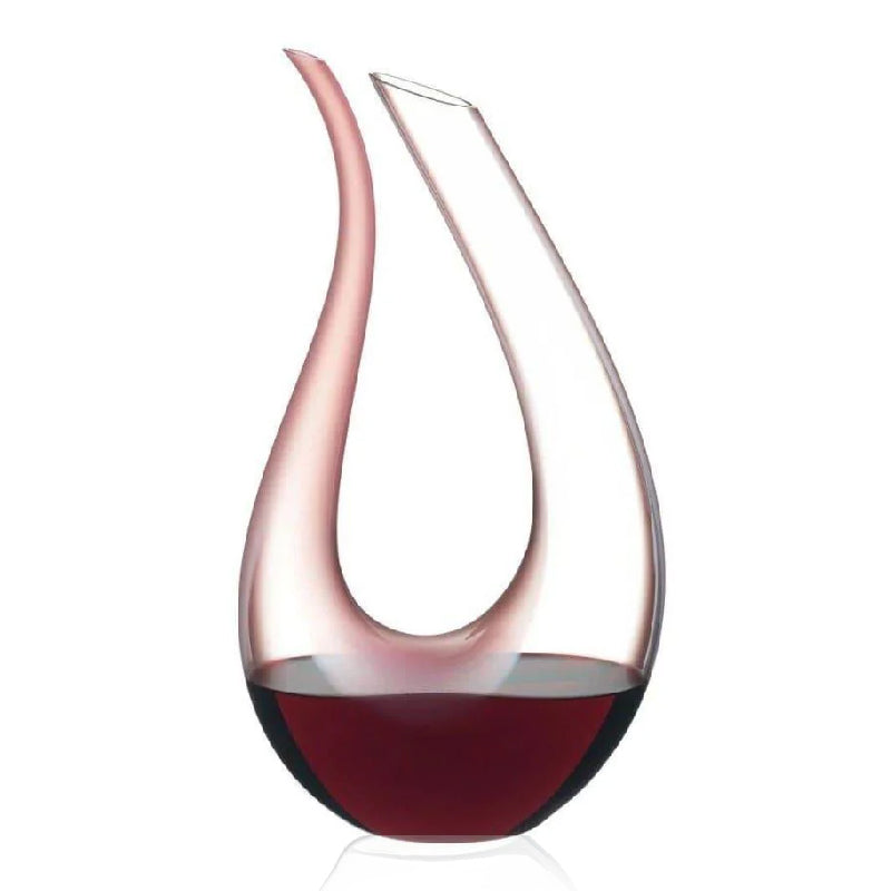 Stunning mouth-blown crystal decanter from Riedel, part of the Amadeo Rosa 1756 series. Holds 1.3 L, featuring a delicate pink hue that elevates wine aeration with elegance and style.