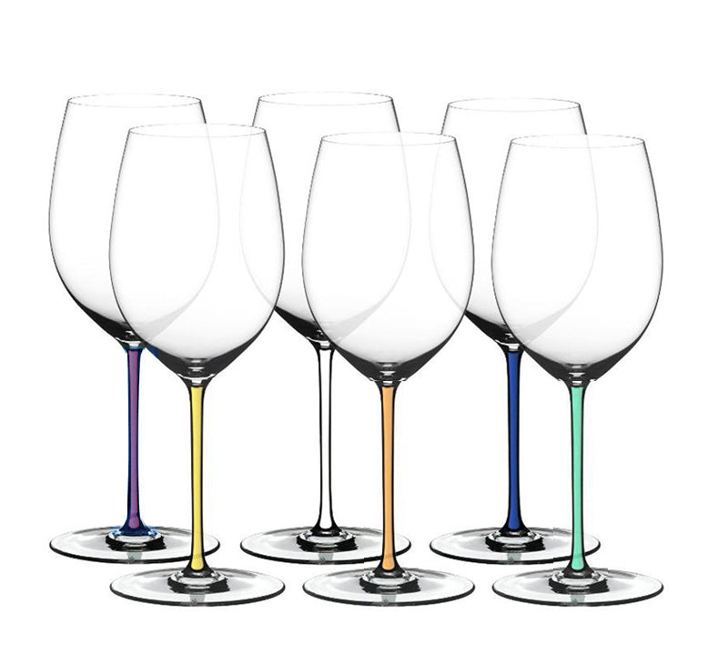 A set of six Riedel glass stemware pieces with colored stems, displayed in two rows with three glasses in each row. The glasses are empty and have a clear body with multicolored stems.