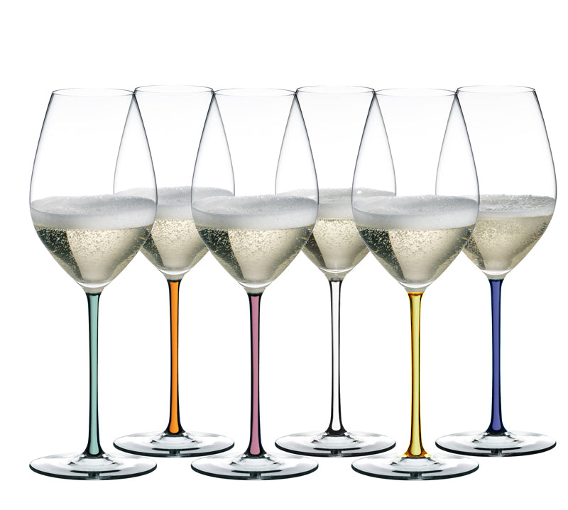 A set of six Riedel Champagne wine glasses with colored stems, displayed side by side with champagne inside.