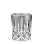 Crystal tumbler with intricate cut design on a white background