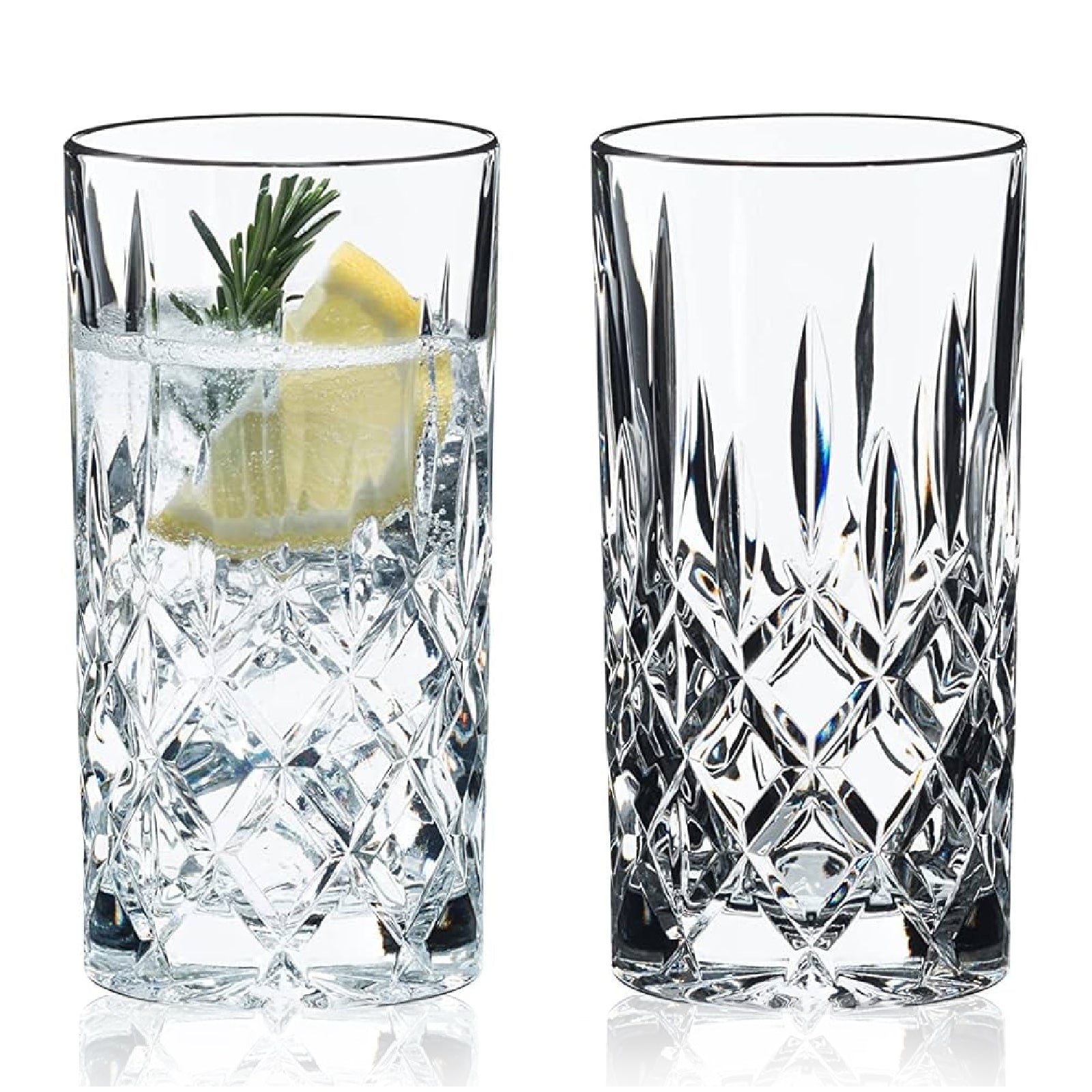 A set of two clear glass lowball tumblers with a lemon slice and a sprig of dill on one of the glasses.