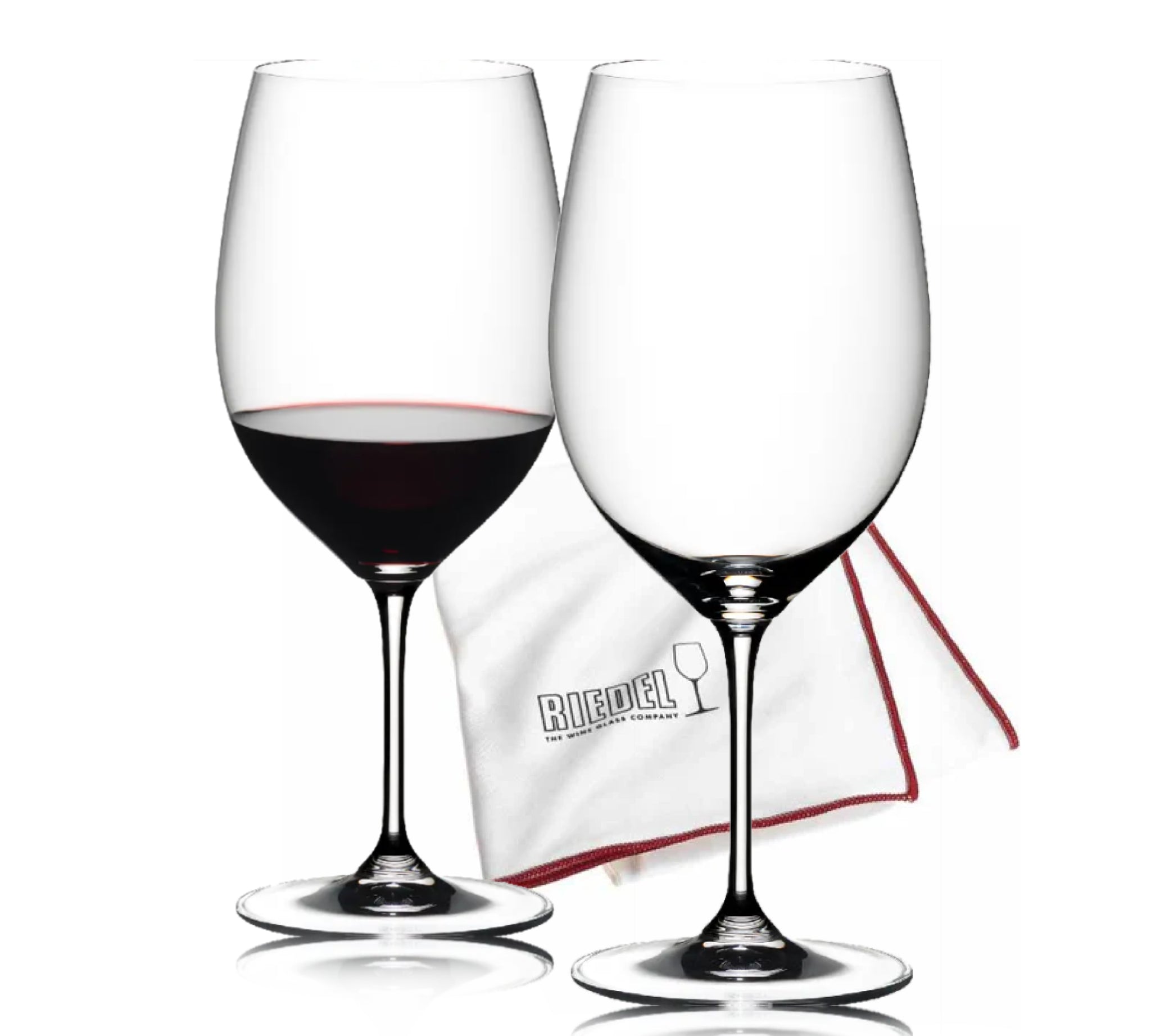 Two wine glasses with red wine and a Riedel branded cloth on a white background
