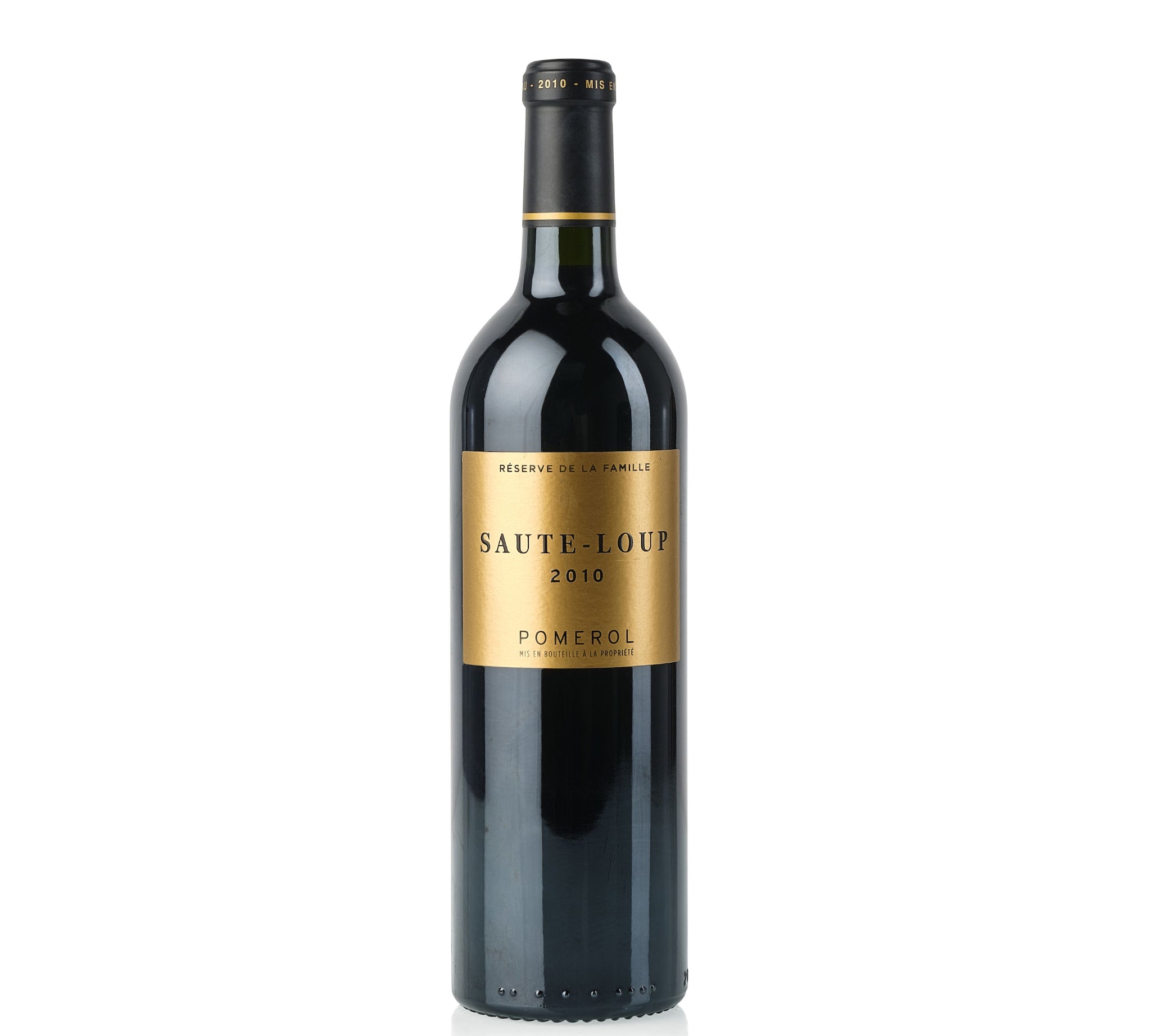 A bottle of Reserves de la Vigne Saut-Loup 2010 Pomerol red wine.