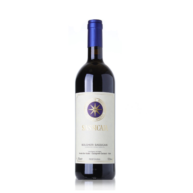 A bottle of Tenuta San Guido Sassicaia red wine with a label featuring a gold star, against a white background.