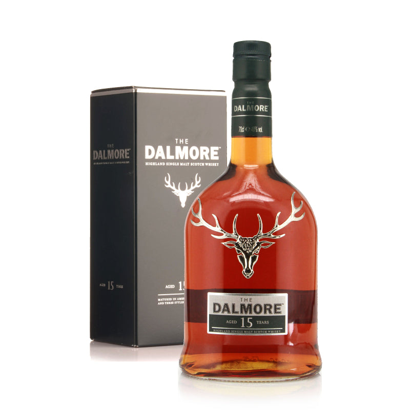 A bottle of Dalmore Single Malt Highland Whisky 15Yrs with its packaging box. The bottle has a dark cap, a label with the Dalmore logo, and a clear amber liquid visible inside.