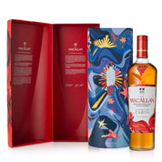 The Macallan whisky bottle with colorful packaging and red box on a white background