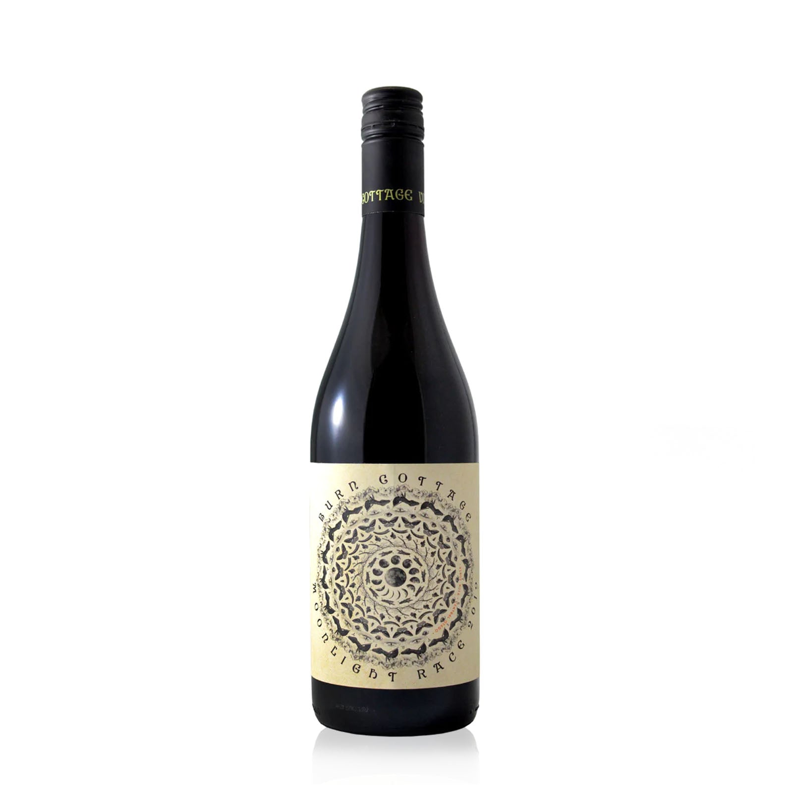 A bottle of Burn Cottage Moonlight Race Pinot Noir wine with a label featuring a mandala design.