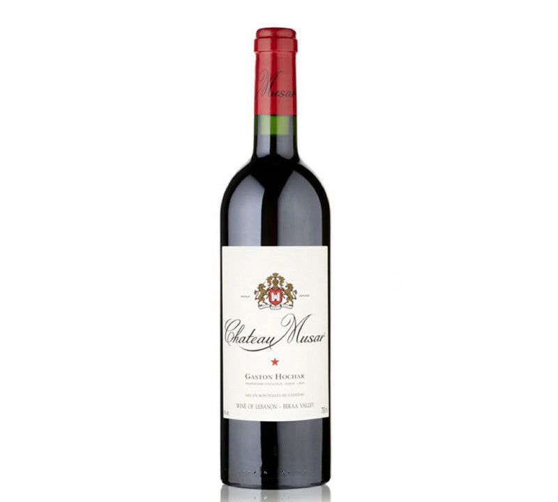 A bottle of Chateau Musar Bekaa Valley red wine with a white label, red cap, and a logo at the top.