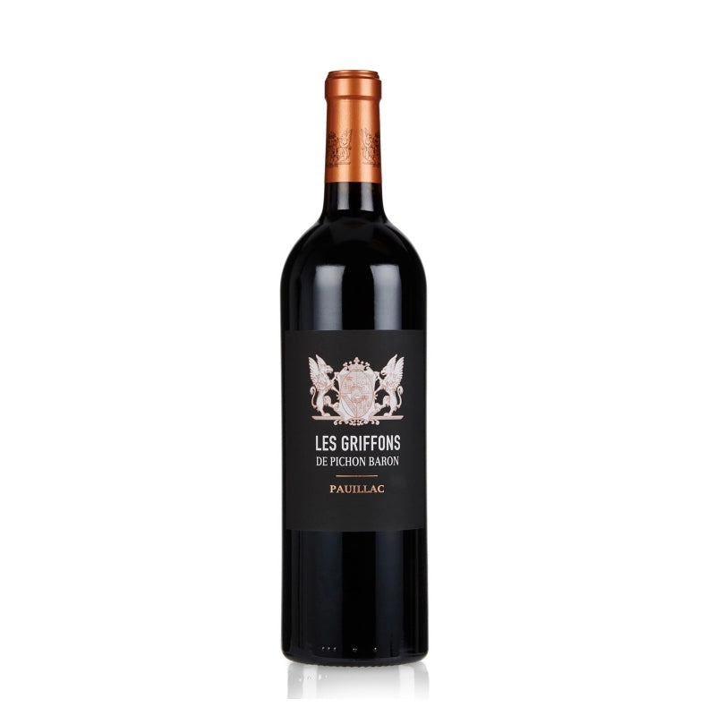 A bottle of Les Griffons De Pichon Baron Pauillac red wine with a dark label and a golden cap.