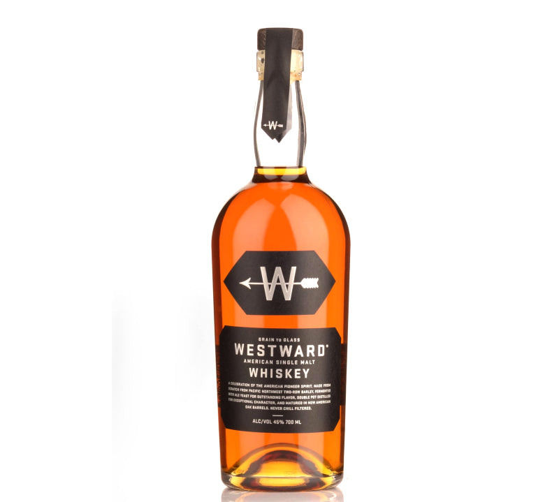 A bottle of Westward American Single Malt Whiskey with a label that has the brand name, whiskey type, and volume information. The bottle cap is on top, and the liquid inside appears to be a amber-colored spirit.
