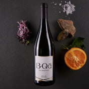 A bottle of Chateau Marsyas B-Qā de Marsyas Blanc, a 750ml white wine blend from Lebanon's Bekaa Valley, with a pale yellow color.