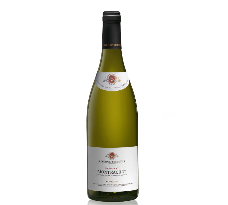 A bottle of Bouchard Pere & Fils Montrachet Grand Cru white wine