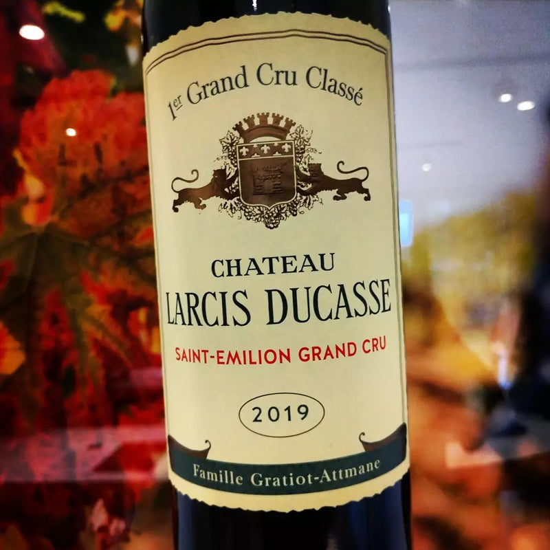 A bottle of Chateau Larcis Ducasse red wine