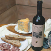 a bottle of El Coto De Imaz Gran Reserva  red wine