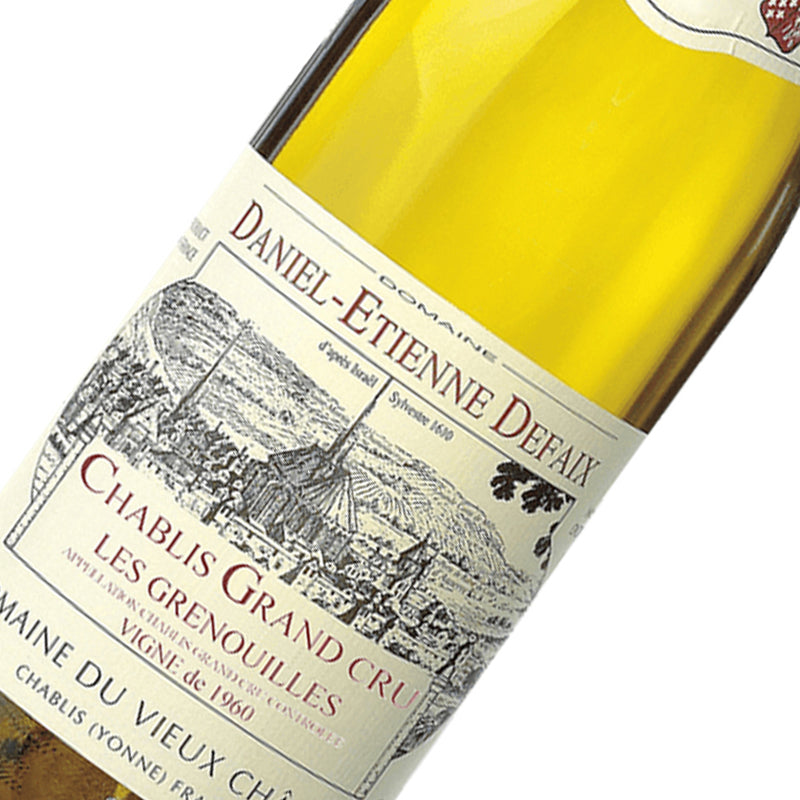 A bottle of Domaine Daniel-Etienne Defaix Chablis Grenouilles Grand Cru white wine