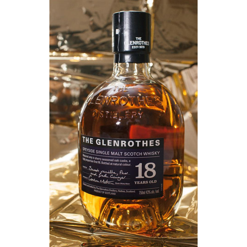 A bottle of The Glenrothes Single Malt Speyside Whisky with a label indicating 18 years old.