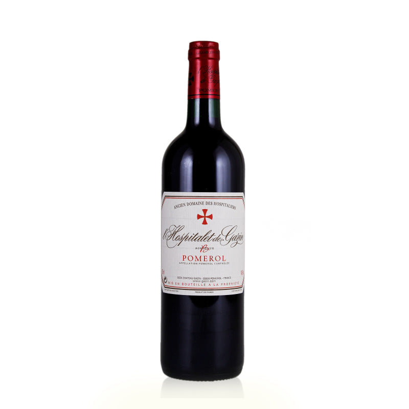 A bottle of L'Hospitalet de Gazin Pomerol red wine with a label that includes the wine name and the word 'Pomerol'.