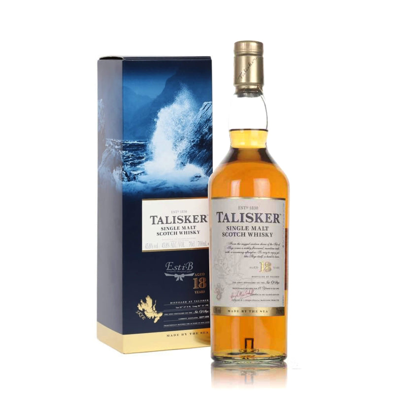 A bottle of Talisker Single Malt Scotch Whisky 18Yrs with its packaging box, displaying the whisky's color and brand details.