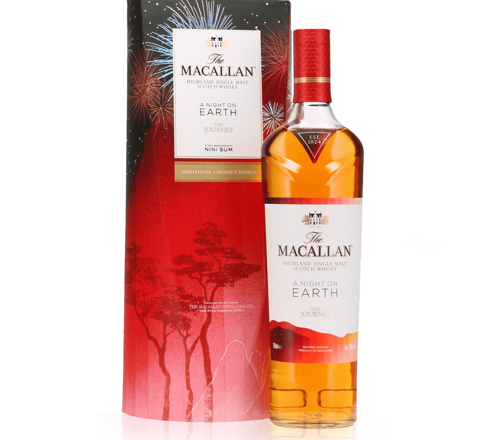 A bottle of The Macallan A Night on Earth whisky with a decorative packaging featuring fiery graphics, a red base, and a gradient to white at the top.